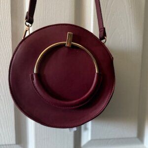 DYNAMITE  Burgundy/Velvet Circle Crossbody Bag Purse with gold accent NWT